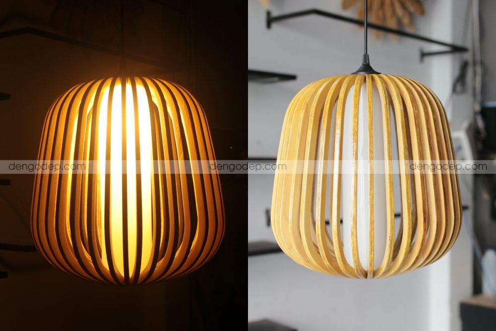 Đèn gỗ thả trần quả lê chụp lúc thắp sáng bên cạnh bản chưa thắp sáng